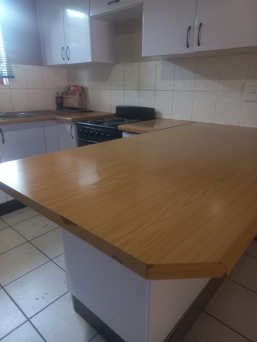 Dated kitchen cabinets before wrapping